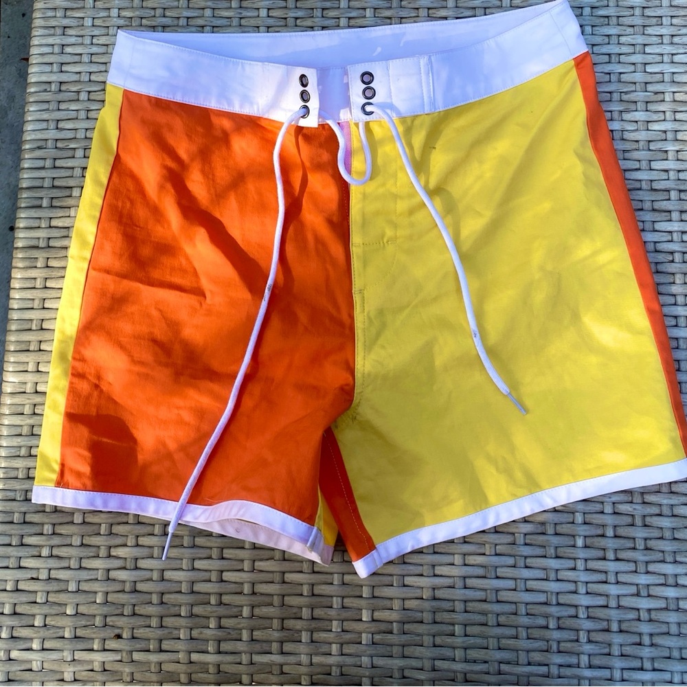 Size 30 waist Hammies board shorts and matching size L swim top